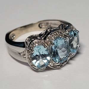 14k White Gold Diamond and Blue Topaz cocktail ring.
